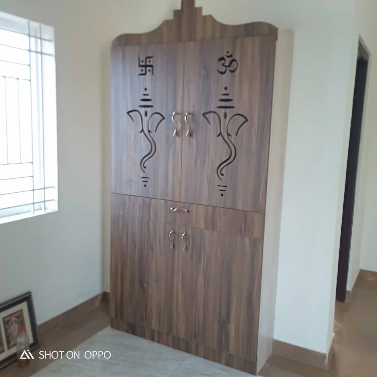 Pooja unit by Aadith Interiors